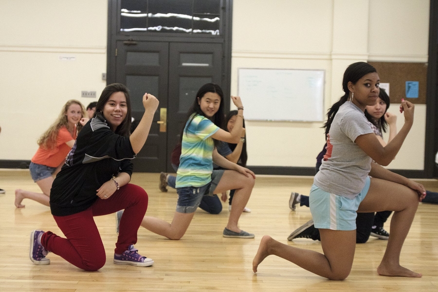 Krystal Arroyo &#39;13 (left, red pants) and prefrosh Kianna Jackson work on a routine at a Hip Hop Dance Class in the DuPont Gymnasium.