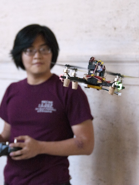 Graduate student Charles Guan, a member of the MIT Electronic Research Society (MITERS), flies a mini-copter in Lobby 7. MITERS is a student group that describes itself as a &#39;build-anything-you-want&#39; club.
