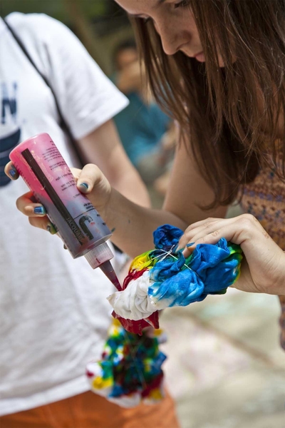 Prefrosh Julie Heyman tie-dyes a shirt at Senior House, an undergraduate dormitory.