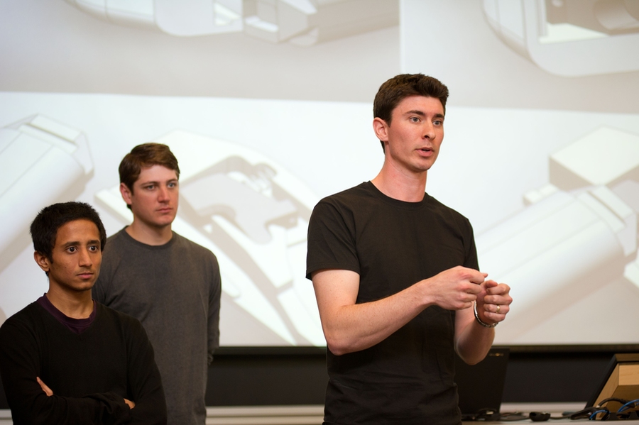 David Linders, a student in LGO, describes design features of a new, quick release bicycle lock invented by his team of students.
From left to right: Tejas Inamdar (mechanical engineering), Cullen Johnson (LGO), David Linders (LGO)