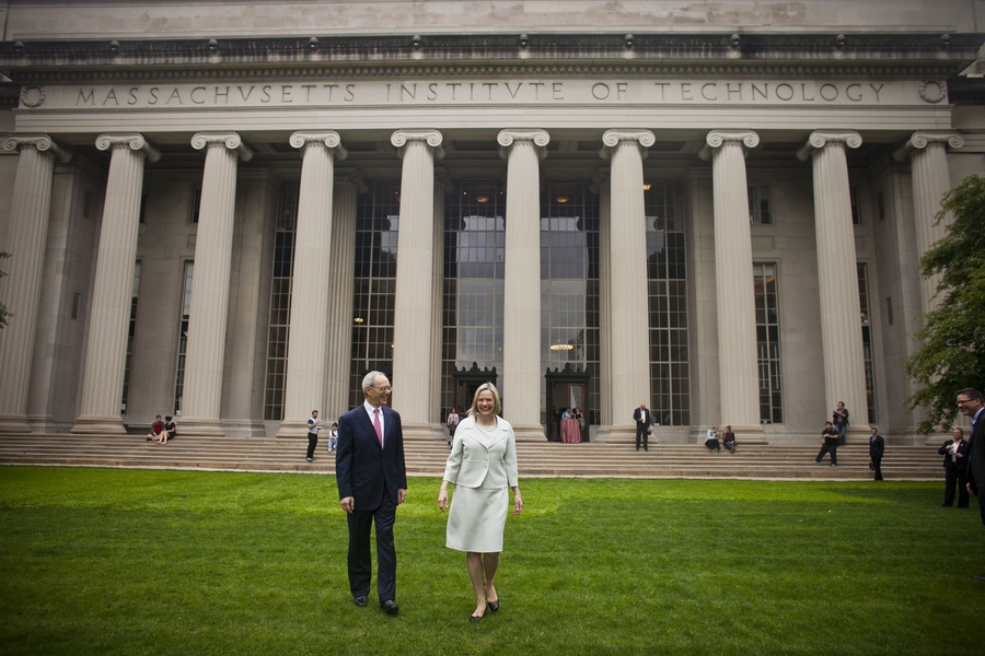 Reif and his wife, Christine, take a moment to stroll through Killian Court in front of MIT's large dome and Lobby 10, where a community reception was held.