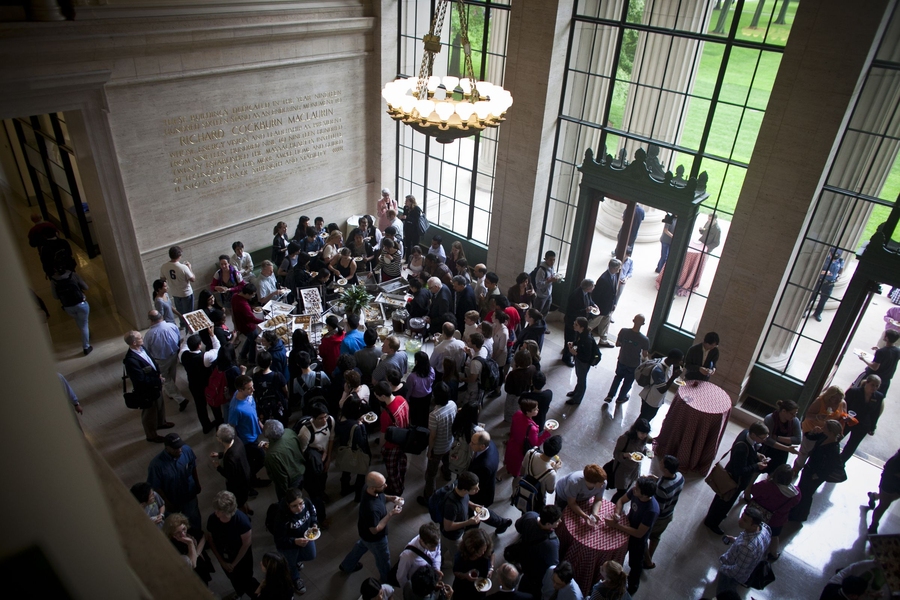 Students, faculty, staff, alumni and friends of the Institute gather in Lobby 10 for a reception after the community event.