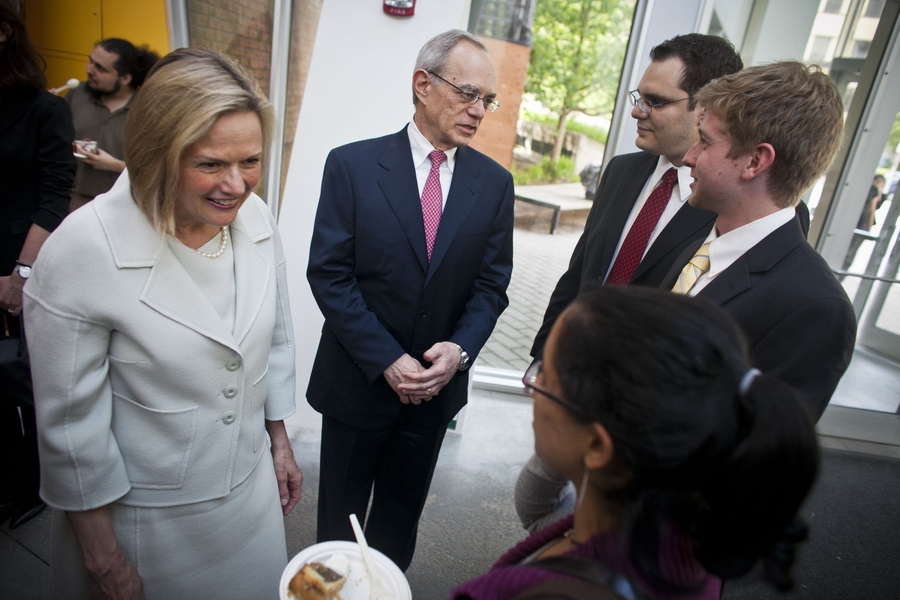 Reif and his wife, Christine, talk to students at a welcome event in the evening.