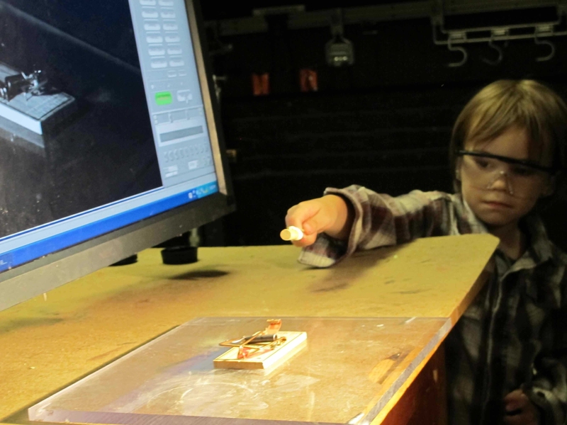 Felix Metral about to trigger the rat trap while the high-speed video records the action, 6,000 frames per second, slowed by 25 times.