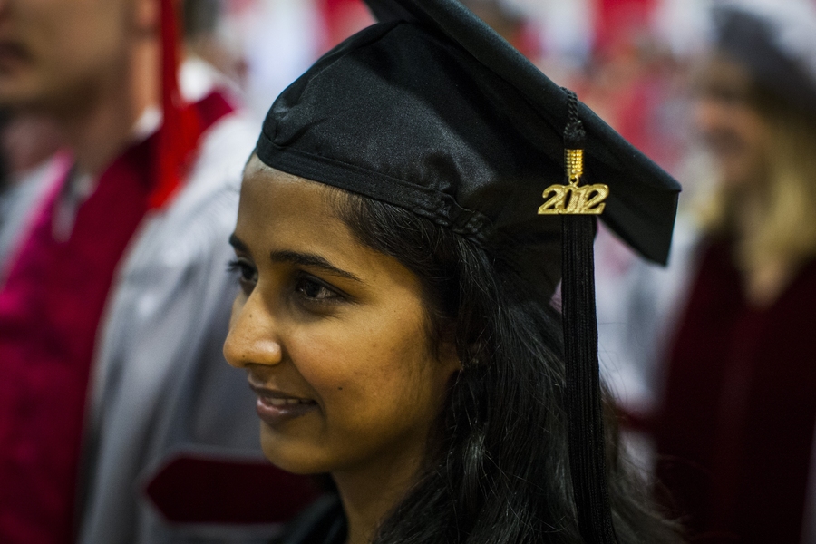 A member of the Class of 2012 waits for the ceremony to begin.