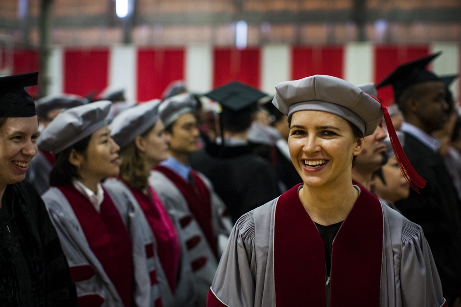Doctoral students wait for the ceremony to begin in Rockwell Cage.