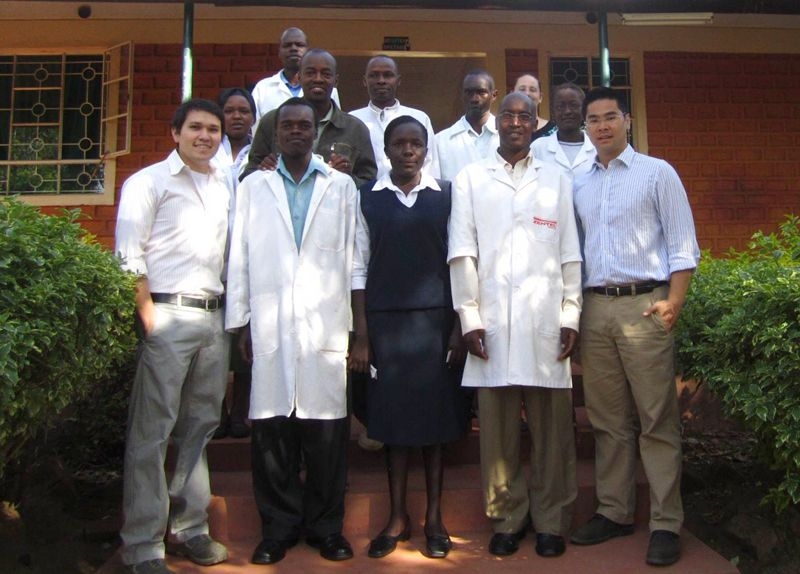 Dave Hilliard, far left, and Thapana "Pipe" Chairoj, far right, with the clinical staff of the United Pentecostal Evangelist Church (UPEC) Chebaiywa Health Center in Kenya.