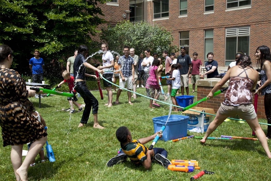 As temperatures soared to 90 degrees, the Sidney-Pacific courtyard turned into a water-gun battle arena.
