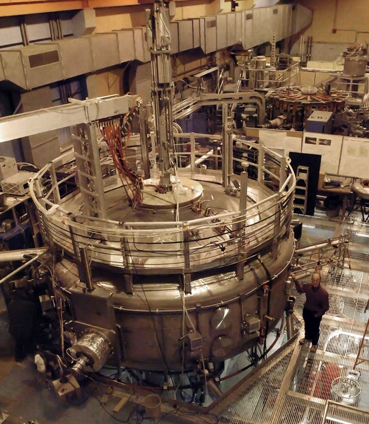 MIT research scientist Jay Kesner stands with the Levitated Dipole Experiment, one of the experiments that will be used to study space weather in a collaboration with Columbia University.
