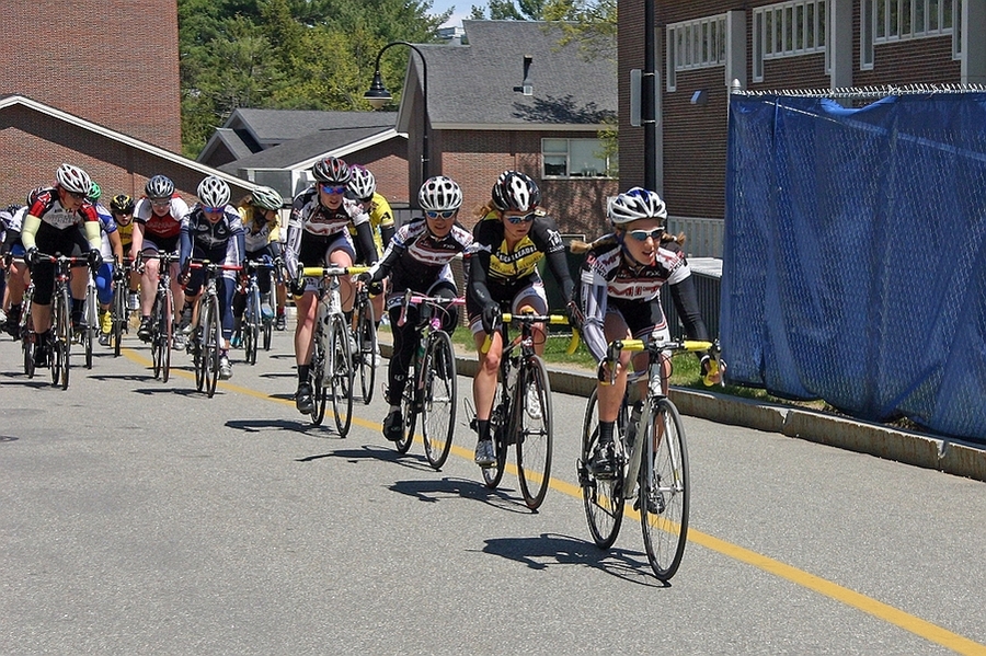 The MIT women organize a leadout train for a sprint in the Eastern Collegiate Cycling Conference (ECCC) championship criterium. MIT junior Shaena Berlin (right) sets a hard pace on the front of the race with her teammates following. One by one they'll peel off until graduate student Christina Birch (fourth from right) sprints to the finish line.
