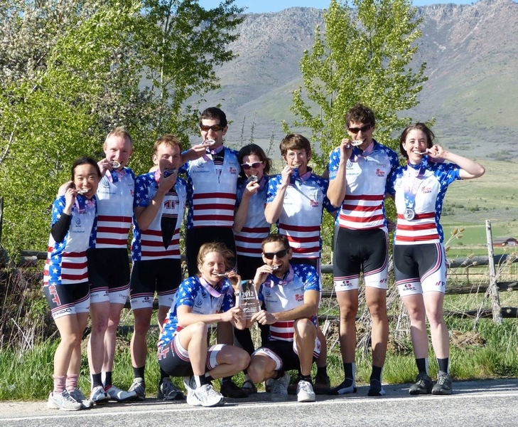 The victorious members of the MIT Cycling Team bite into their gold medals after placing first in the 2012 USA Cycling Collegiate Road National Championships in Ogden, Utah. The MIT team has won national titles in various events over the past several years, establishing the club as a perennial powerhouse.