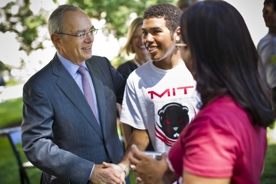 Reif greets students after the ceremony.