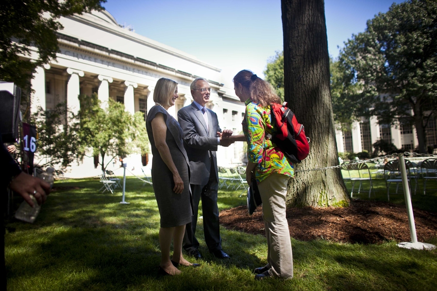 Reif and his wife, Christine, greet a member of the Class of 2016.