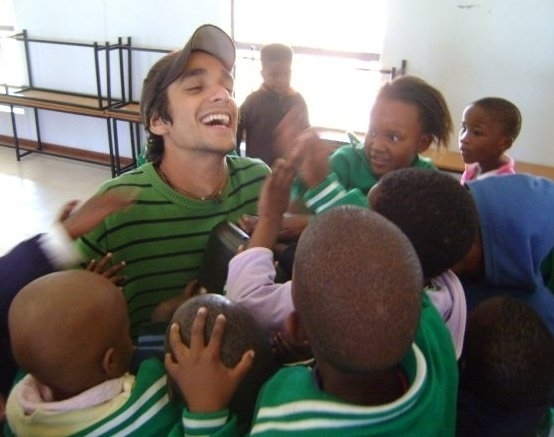 Sebastian Modak with students in Africa.