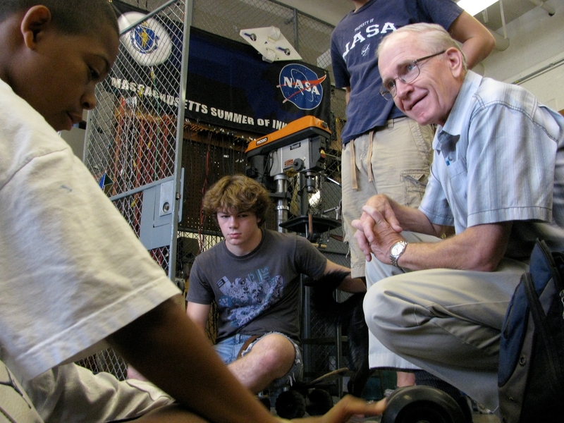 As part of the Massachusetts Summer of Innovation, NASA helped to fund the 2010 Engineering Design Workshop at the Edgerton Center. J. Kim Vandiver, at right, discusses projects with the high-school participants.