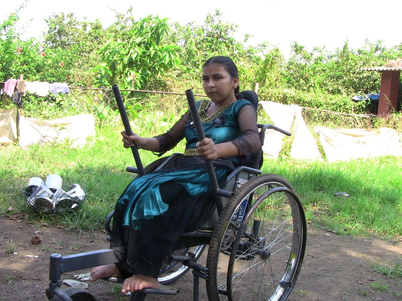 An Indian woman tests the Leveraged Freedom Chair (LFC) outside of Mumbai during the field trial in India. In 2007, Amos Winter SM &#39;05 PhD &#39;11, assistant professor of mechanical engineering, introduced the D-Lab class Wheelchair Design in Developing Countries (EC.721). In 2008, Winter and his team developed the LFC; its design has evolved with field trials in East Africa, Guatemala and Ind...