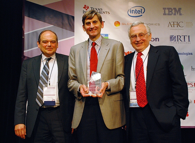 Photo: Jes&uacute;s del Alamo (standing middle) receives the Semiconductor Research Corporation 2012 Technical Excellence Award from Steven Hillenius, SRC Executive Vice President (left) and Larry Sumney, SRC President & CEO (right), at the TECHON Conference in Austin TX Sept. 10, 2012.
