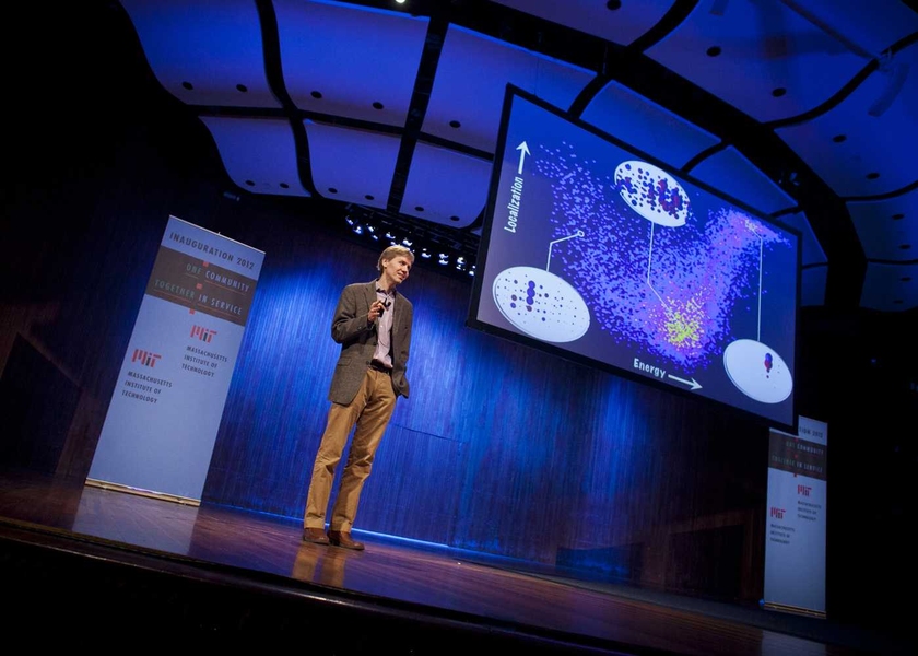 Troy Van Voorhis, a professor in the Department of Chemistry, delivers his remarks at the symposium.