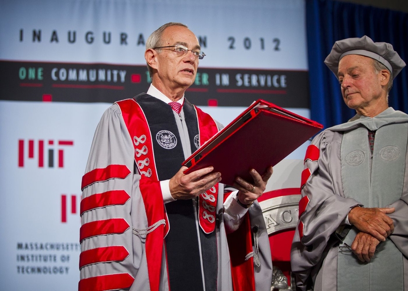 Reif receives the MIT charter from MIT Corporation Chairman John Reed.