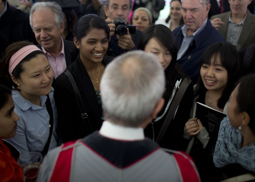 Reif greets community members after the event.
