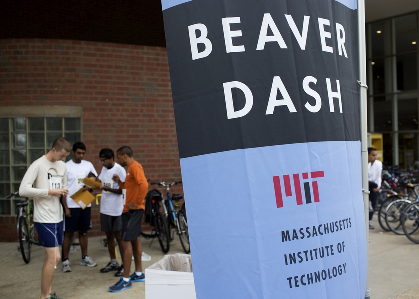 Runners get their numbers prior to the start of the Beaver Dash road race, which raised money for Habitat for Humanity.