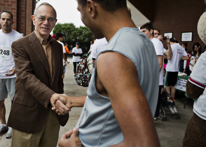 Reif greets the runners before the road race.