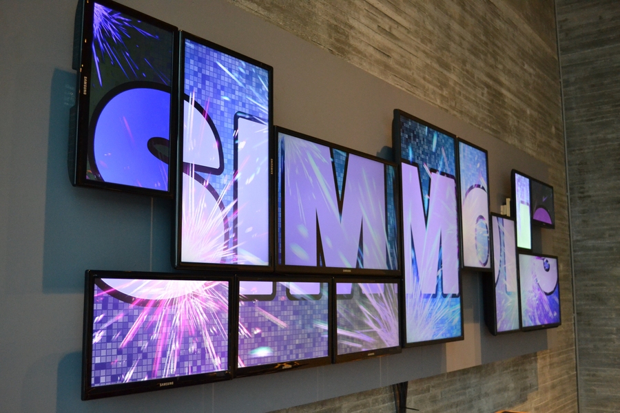 The newest piece of Simmons artwork will continue to hang in the dining hall. It is made of 12 Samsung LED displays constructed to represent the building&#39;s iconic shape.