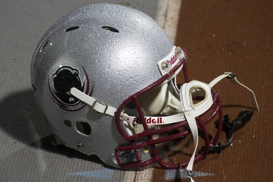 Better helmets, sensored mouth guards part of effort to make football safer