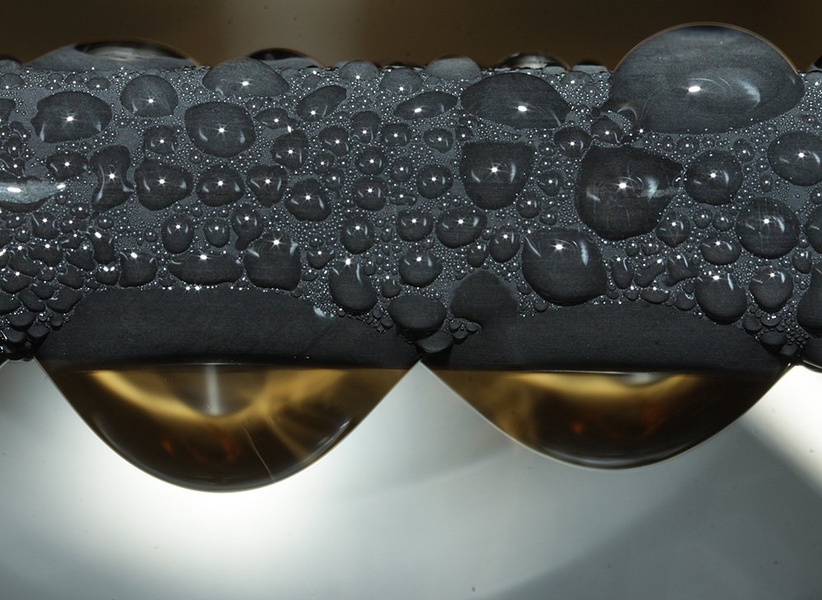 Jumping-droplet condensation shown on a nanostructured tube.