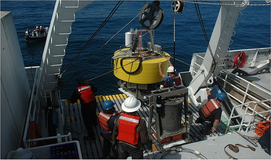 This photo shows researchers readying the robotic device connected to a buoy for its two-day sampling journey off the coast of California.