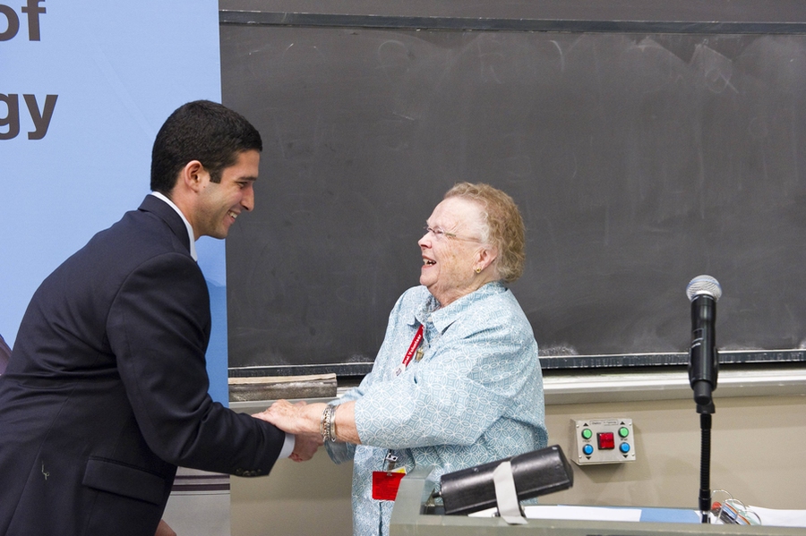 Gray presents the award to Noam Angrist '12 at the 2012 MIT Awards Convocation.