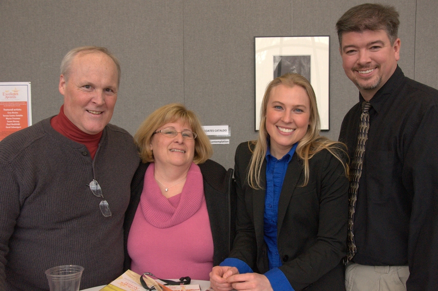Unsung Hero Award recipient Jessica Holland (second from right) poses with her family.