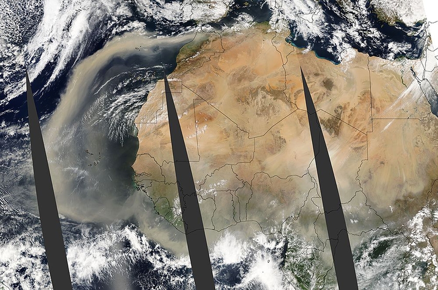 An immense dust storm over central Africa is seen in images taken during consecutive overpasses of NASA's Aqua satellite. The dust appears thickest to the right of center, in a region known as the Bodele Depression, once the location of a large lake. Now the region is one of the largest sources of wind-blown dust on Earth.