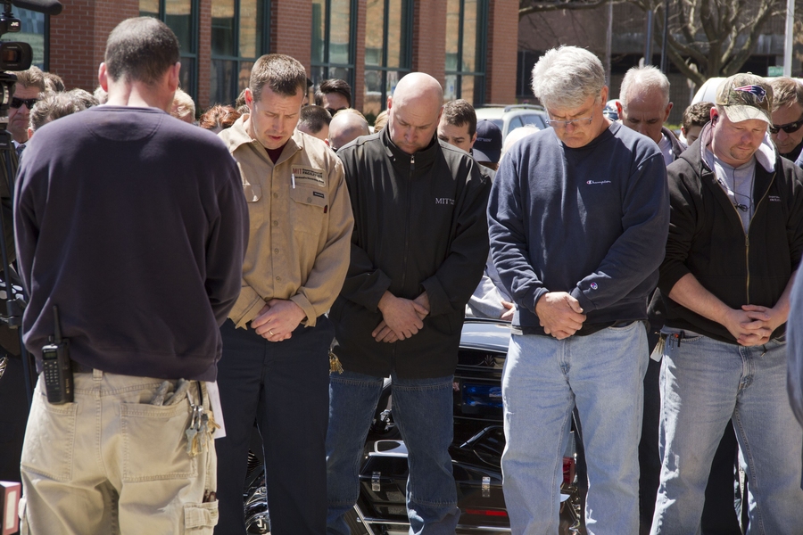 Facilities employees paused to remember Officer Sean Collier.