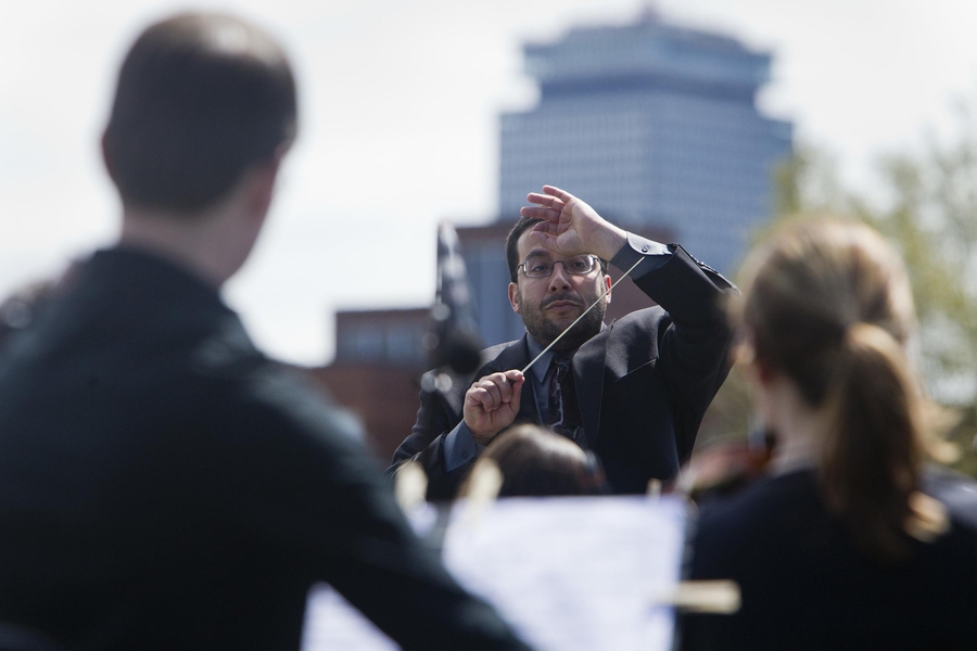 Adam Boyles, a lecturer in the Music and Theater Arts Section, led the MIT Symphony Orchestra, which provided music during the memorial.