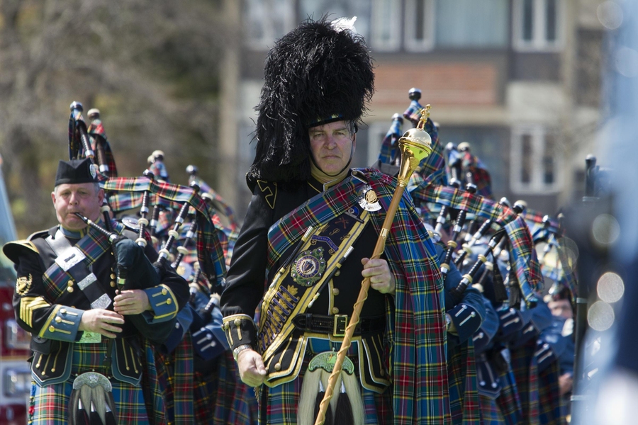 The Massachusetts State Police Pipes and Drums led the casket into Briggs Field.