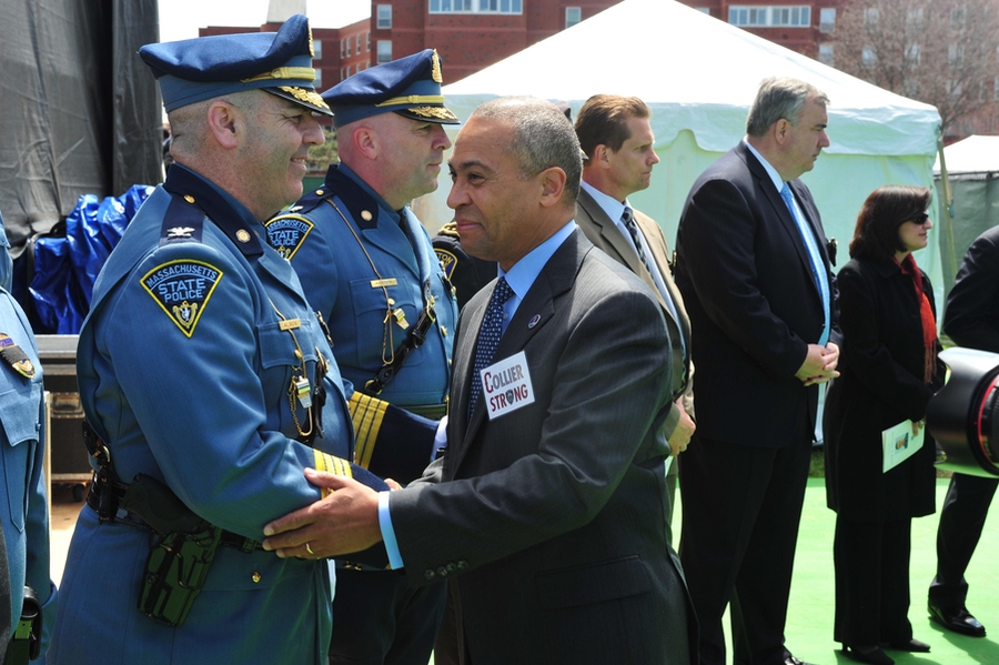 Massachusetts Gov. Deval Patrick shakes hands with members of the Massachusetts State Police.