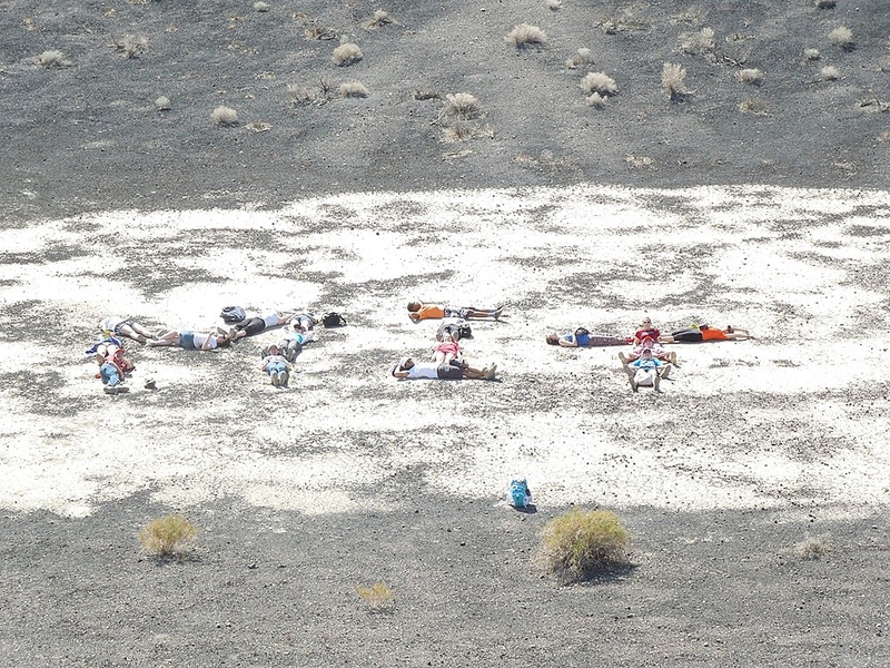 Students gathered in the middle of Little Hebe crater to spell out 'MIT.'