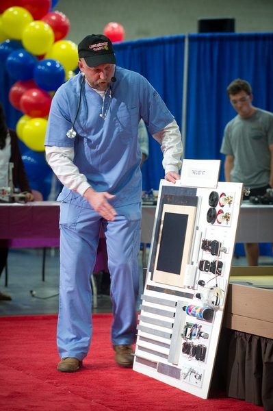 Dan Frey, lead instructor for mechanical engineering class 2.007, displays the kit of materials provided to each of the students at the beginning of the semester. With a few exceptions such as decorative elements, students can only use these parts in the construction of their robots.