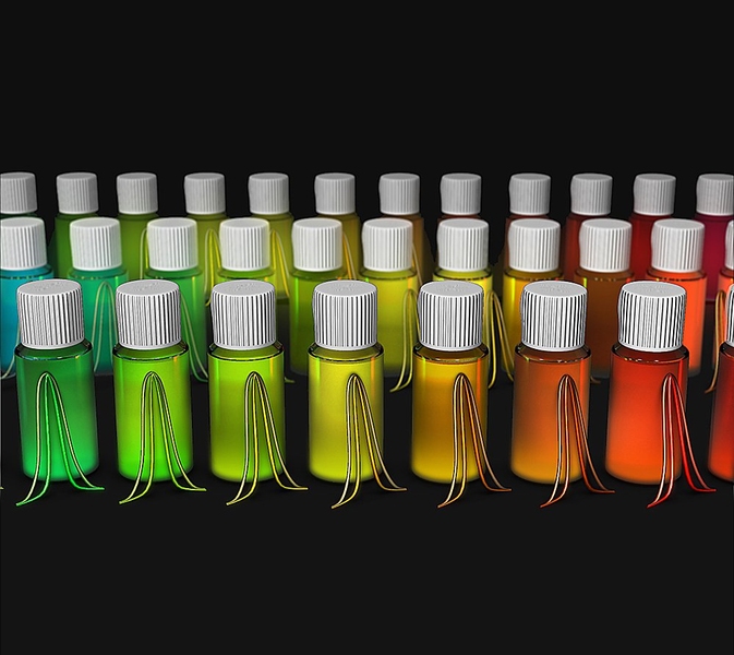 Vials containing colloidal semiconductor quantum dot nanocrystals (NCs) emit colors that are determined by the exact size of the particles. In this image, curves in front of each vial show the measurements made by the MIT team: The outer, wider curve shows the spectrum of colors from all the NCs in that vial, while the narrower curve shows the average single-particle spectrum within that vial. Unt...
