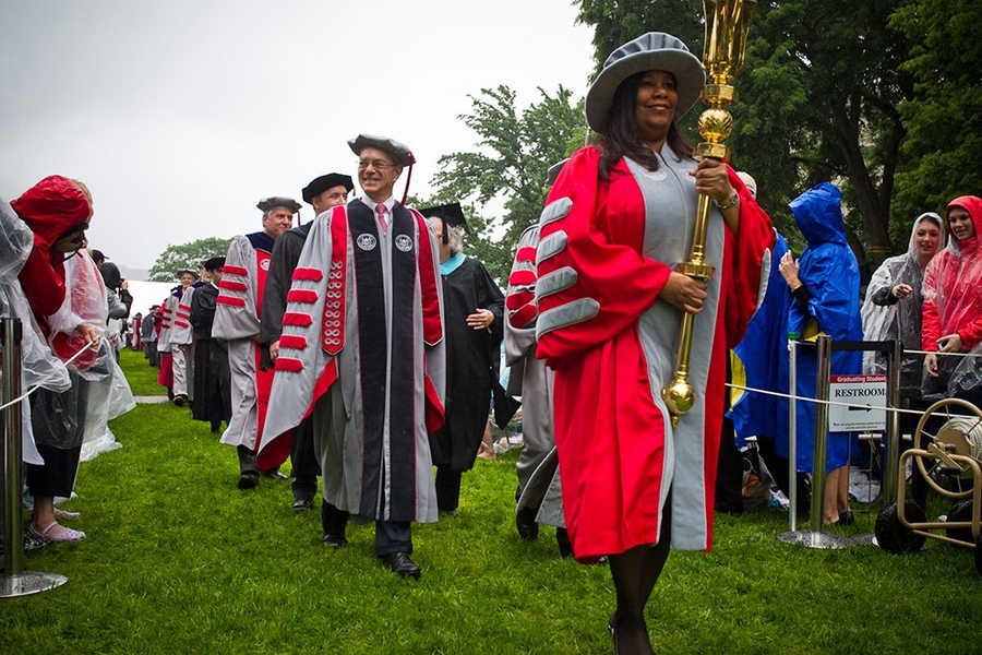 Chiquita White, president of the MIT Alumni Association, leads the procession into Killian Court.