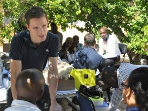 Jonas Hiltrop (standing) at a breakout session with aspiring South African entrepreneurs, who visited his ghdLab team at a Cape Town clinic.