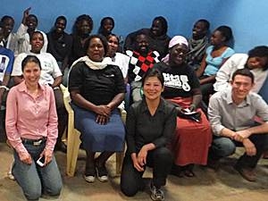 LGO student Erna Pardede (center) and her teammates Cinthya Avalos  (left) and Zachary Cohen (right) posed with the SHOFCO clinic staff in Nairobi, Kenya.