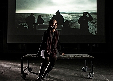 Renée Green is shown before an image from her feature film, +Endless Dreams and Water Between.+