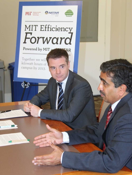 Israel Ruiz, MIT’s executive vice president and treasurer (left) and Tilak Subrahmanian, vice president of energy efficiency for Northeast Utilities extend the award-winning 'Efficiency Forward' program for another three years.