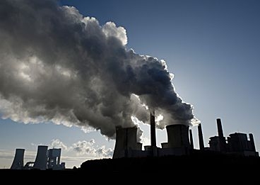 Photo of pollution coming out of two large smokestacks