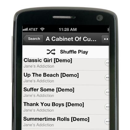 Mobile phone displaying song playlist