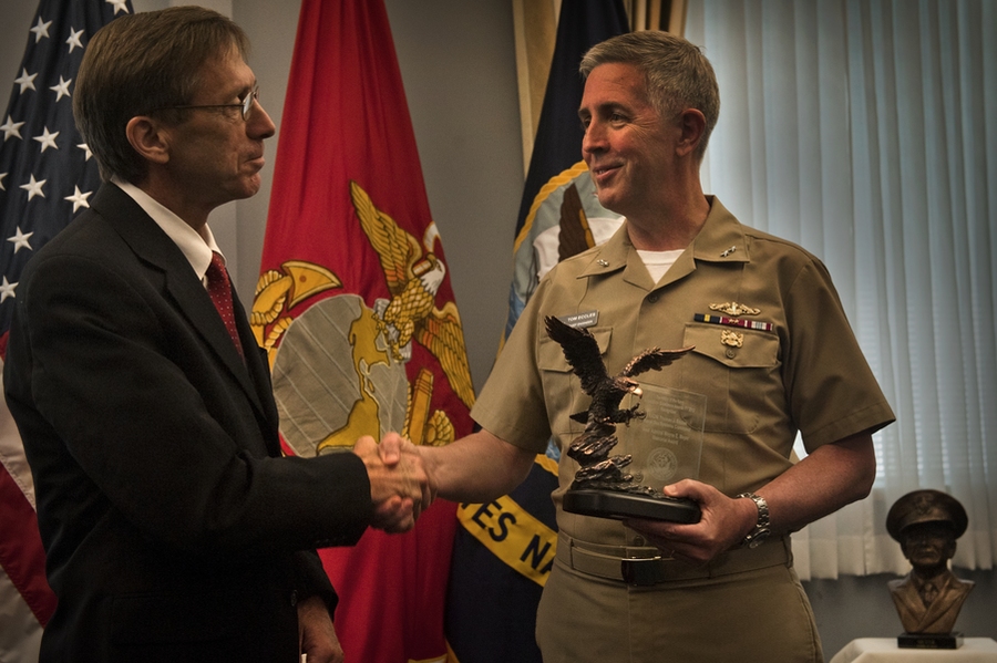 Assistant Secretary of the Navy Sean Stackley presents Adm. Thomas Eccles with the award last month.