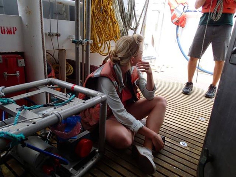 Young aboard a research vessel on the Pacific Ocean for the launch of BotCam, a robotic surveillance system designed for the National Oceanic and Atmospheric Administration.