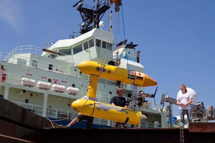 At Woods Hole Oceanographic Institution launching SeaBed, a marine robot designed to help create 3-D under-ice maps to monitor changes in the climate.